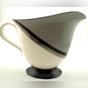 Sasaki “Tucson”  creamer. Gray, black and white.